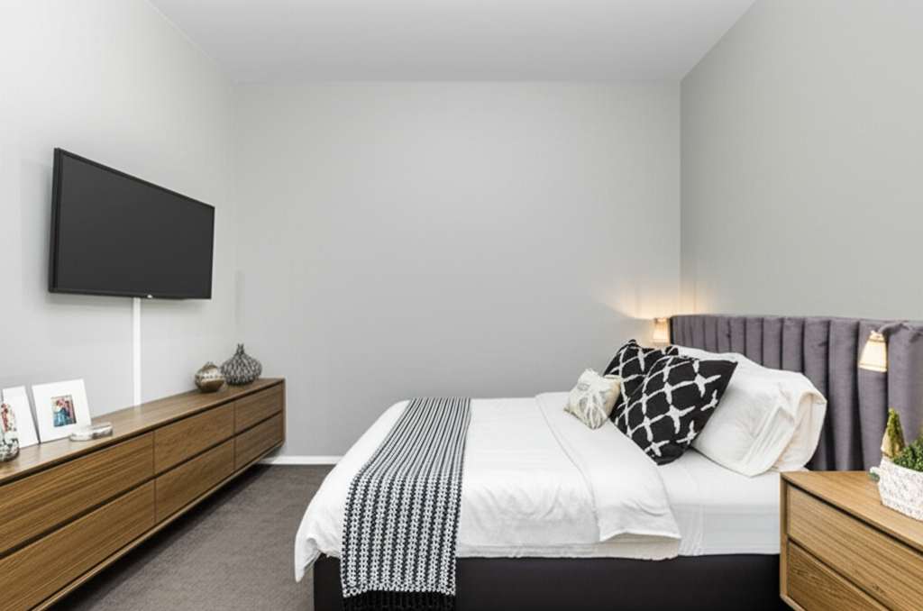 Generate a high-quality, relevant image prompt for an article about: Small Bedroom Layout Ideas With